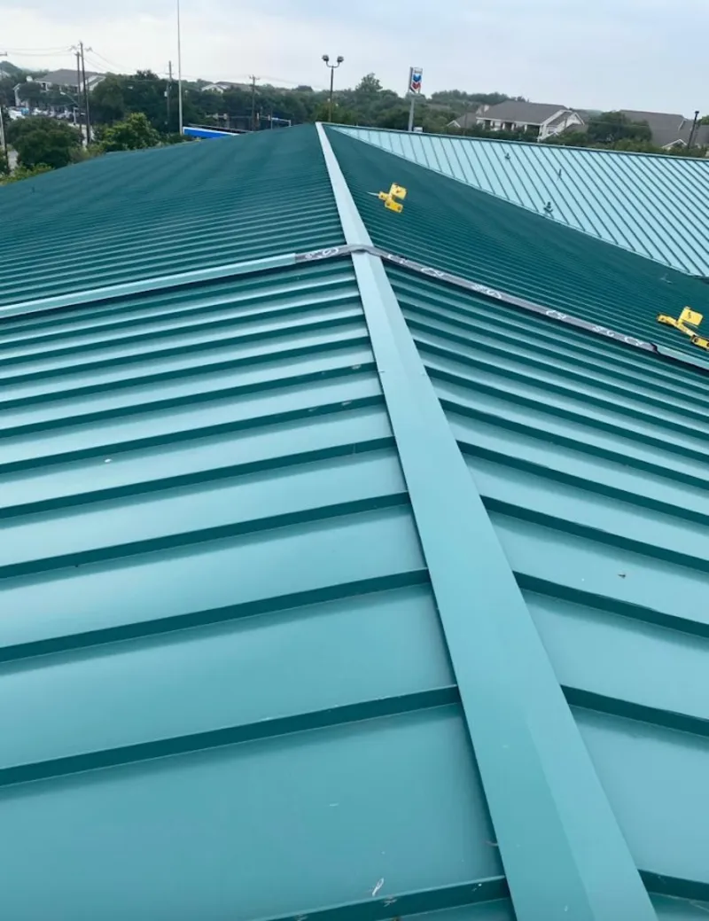 Green commercial metal roof ridge and valley for Metal Roof Repair in Greenbelt