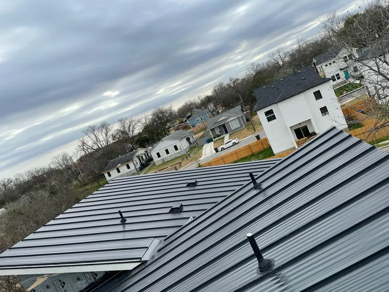 Standing seam metal roof panels with vents for Skylight Repair in Greenbelt